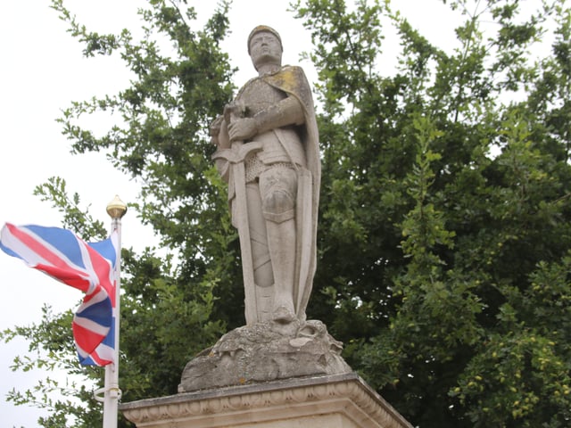 A service at the war memorial in Whittlesey to mark the 75th anniversary of VJ Day. Photo: Robert Windle
