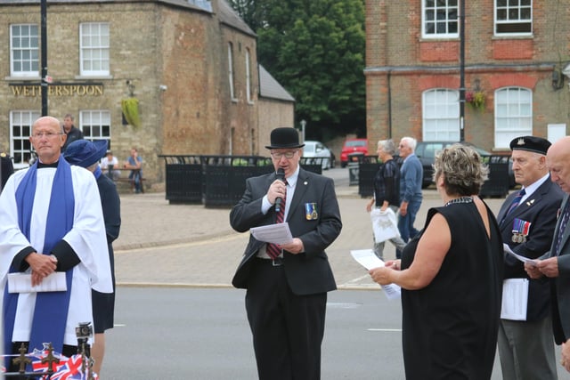 A service at the war memorial in Whittlesey to mark the 75th anniversary of VJ Day. Photo: Robert Windle
