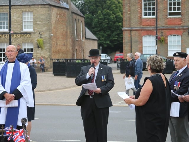A service at the war memorial in Whittlesey to mark the 75th anniversary of VJ Day. Photo: Robert Windle