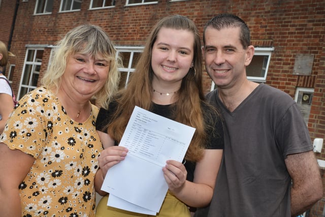 Lois Hilton with her parents Karen and Mark. Maths 9, RE 9, Biology 9 and English Literature 9.
