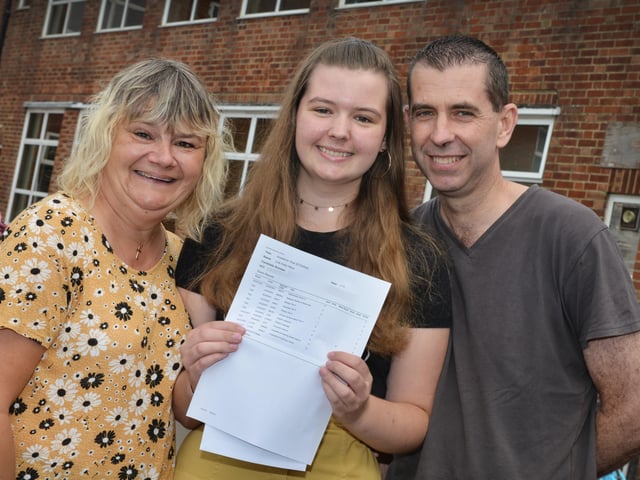 Lois Hilton with her parents Karen and Mark. Maths 9, RE 9, Biology 9 and English Literature 9.