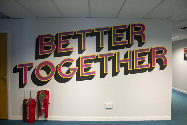 'Better together', painted by mural designer Chloe Parkes