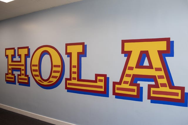 'Hola', a welcome message in Spanish in the modern foreign language department