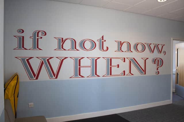 'If not now, when?', painted by mural designer Chloe Parkes