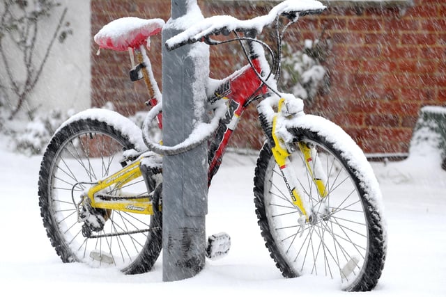 Snow hit Burgess Hill on Saturday 18th Dec. Abandoned bike in Orchard Road, Burgess Hill ENGSNL00120101220104458