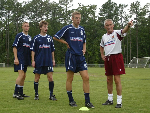 Denis Casey issues instructions to Paul Reid during a training session on the Cobblers' pre-season trip to USA in the summer of 2003