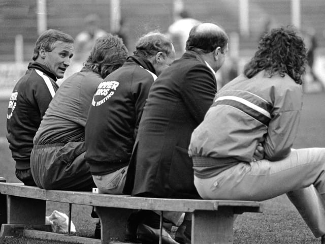 Denis Casey on the bench for a match at Port Vale, along with Clive Walker, Graham Carr and Trevor Morley