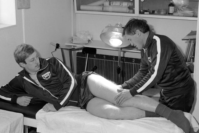Denis Casey treats Graham Reed in the physio room at the Cobblers old club offices on Abington Avenue