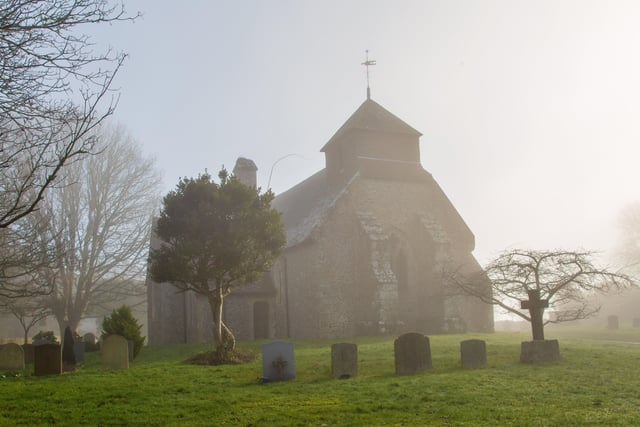 Friston Church in the fog. This wintery shot was taken by Barry Davis with a Canon 5d mark iii. SUS-210120-112302001