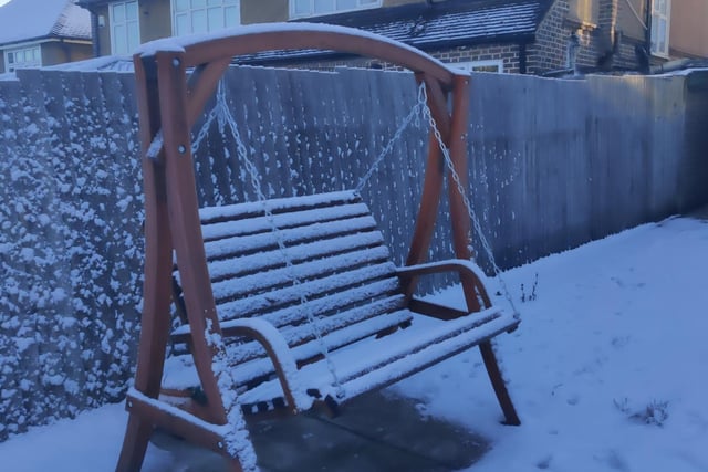 This snow covered swing chair was pictured at dusk by reader Narmeen Anwar