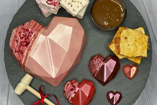 'Dilicious Wedding cakes' are offering a selection of £35 Valentine's Treatboxes, which include a large Belgian chocolate heart that can be smashed to reveal homemade brownie bites in triple chocolate and salted caramel flavours. It also includes chocolate hearts, marshmallow, honeycomb and toffee or chocolate sauce.