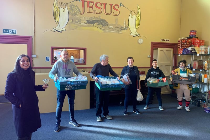 The community group award was shared between homeless charity LWS Night Shelter and the New Life Church, in Friar Street, Warwick. The church was recognised for distributing more than 63,000 food parcels to those in need. 
Pictured is Stacey Bains with volunteers at the New Life Church.