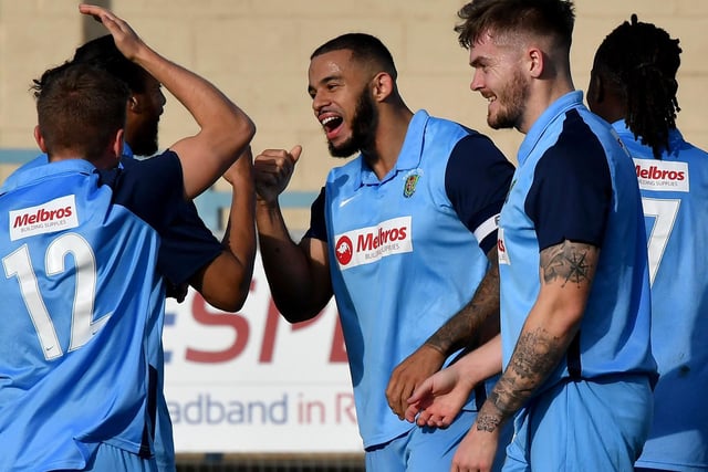 Loyiso Recci celebrates scoring Rugby Town's second goal