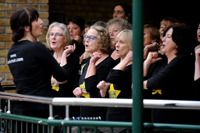 Rock Choir members performing at the Burgess Hill Christmas Lights switch on in 2014. Picture: Steve Robards.