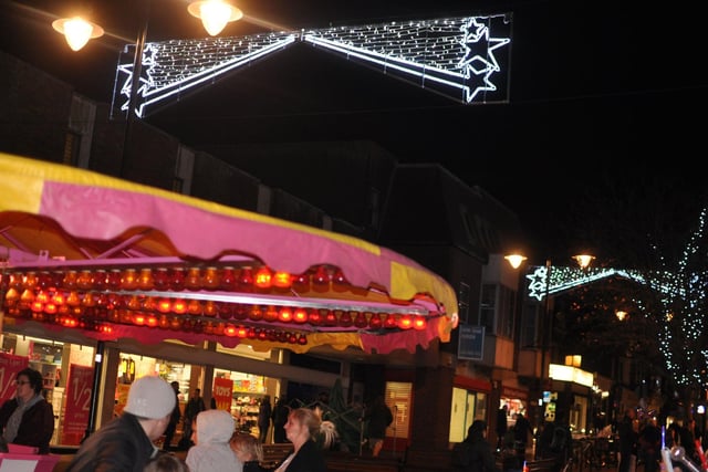 The Christmas lights shine above the fun at Burgess Hill in 2013. Picture: Phil Dennett.