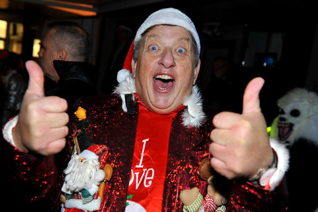 A resident gives Burgess Hill Christmas lights switch on two thumbs up in 2018. Picture: Steve Robards, SR1830591.