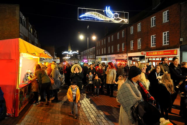 Crowds enjoy the food and fun at various stalls at Burgess Hill's Christmas lights switch on in 2018. Picture: Steve Robards, SR1830601.