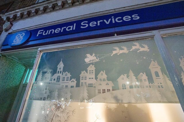Co-op Funeral Services Window Wanderland display. EMN-211213-104347001