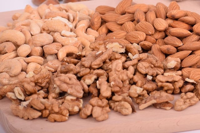 Although not all nuts are toxic, they are all high in fat and serve as potential choking hazards for those extra-greedy dogs who are too excited to remember to chew properly. Also, feeding your pooch nuts that are overly salty can also lead to complications with their water retention.