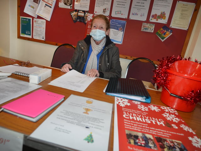 Surviving Christmas volunteers making hampers at the Salvation Army hall in Hastings. SUS-211214-121415001
