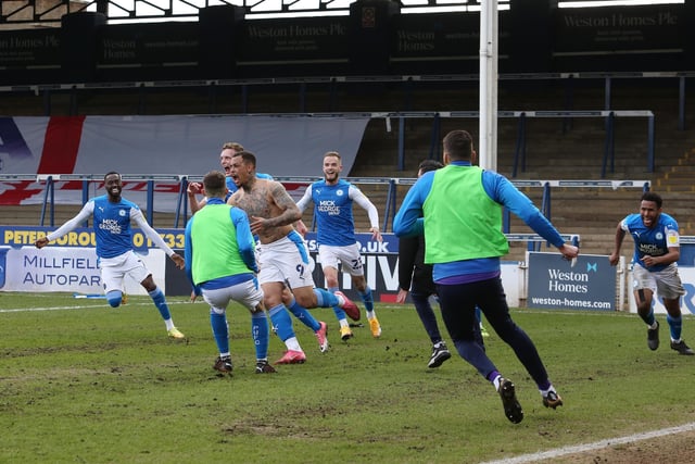 A moment that will never be forgotten. Jonson Clarke-Harris, just moments before, had slammed in a 96th minute penalty that ended Posh's eight year stay in League One and completed an improbable comeback for a Posh side that found themselves 3-0 down in the 65th minute.
