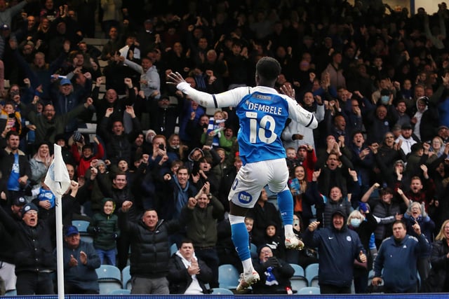 Where would Posh be without that man? This great shot captures the celebrations after another stoppage time winner from Dembele as Posh put together their first and only back-to-back wins of the season with victory against QPR.