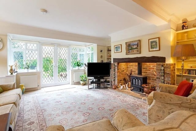 The double aspect sitting room gets lots of light from bay windows and French doors that lead out onto the patio. Picture: Hamptons - Haywards Heath Sales.