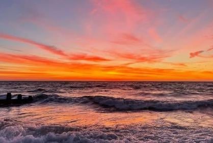 Sunrise at Eastbourne beach by Sonia Caroline Holman SUS-220501-154837001
