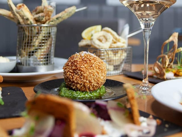For £40 per person, you can share seven small plates of fine Italian food at Nuovo, including gnocchi fontina, arancini and slow-roasted pork belly. Finish by sharing a Nuovo dolce cicchetti platter, which includes panna cotta, chocolate torte, cannoli and tiramisu.