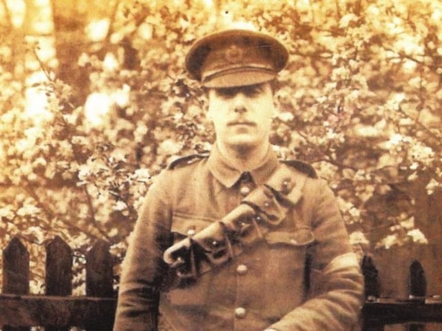 Looking smart in his uniform.