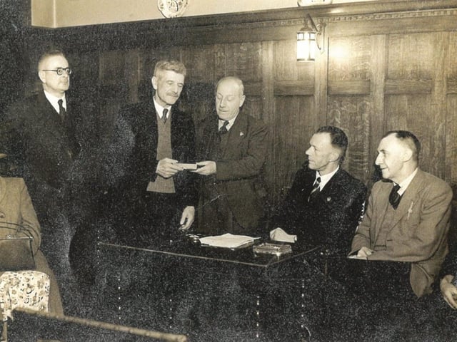 John (fourth from right) with town councillors.