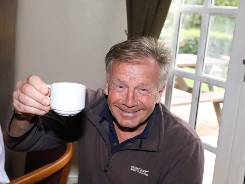 Maisie's Year 7 PE teacher John Tunnicliff toasts Maisie's success with a cup of tea