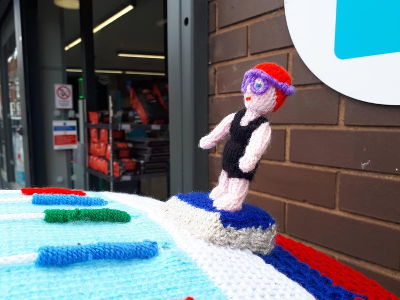 A knitted Maisie takes pride of place on top of the town post box made by Jane Bailey