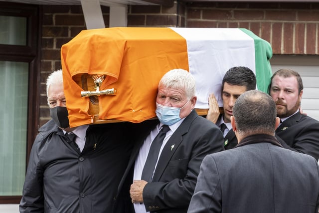 Members of the Storey family carry the coffin of senior Irish Republican and former leading IRA figure Bobby Storey