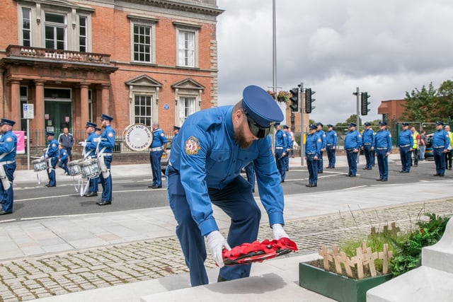 Sam Hughes laid a wreath on behalf of Lambeg Orange & Blue at the Lisburn War Memorial on the Twelfth day,. Pic by Norman Briggs, rmbphotographyni