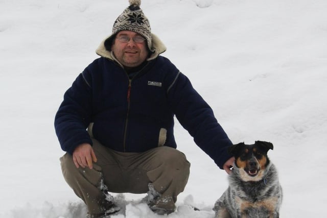 News Letter journalist Darryl Armitage with his dog Scout at Duneight motte and bailey during the Big Freeze of 2010. Picture: Liz Armitage