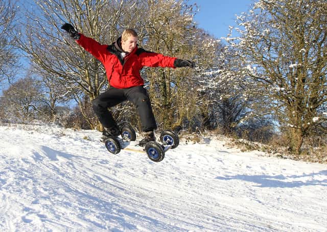 This week we’re looking back at the ‘Big Snow’ of 2010. In this picture we see Daniel Appleton getting airborne as he heads down Sentry Hill on his all weather ‘snowboard’. Picture: John McIlwaine/Ballymena Times archive