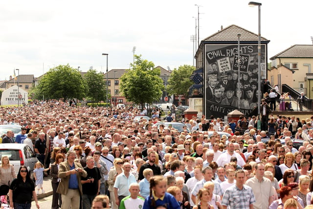 Members of the Bloody Sunday Justice Campaign are joined by the public as they march to the Guildhall from the Bogside on June 15, 2010.