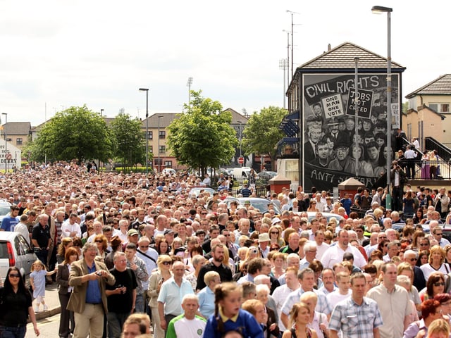 Members of the Bloody Sunday Justice Campaign are joined by the public as they march to the Guildhall from the Bogside on June 15, 2010.