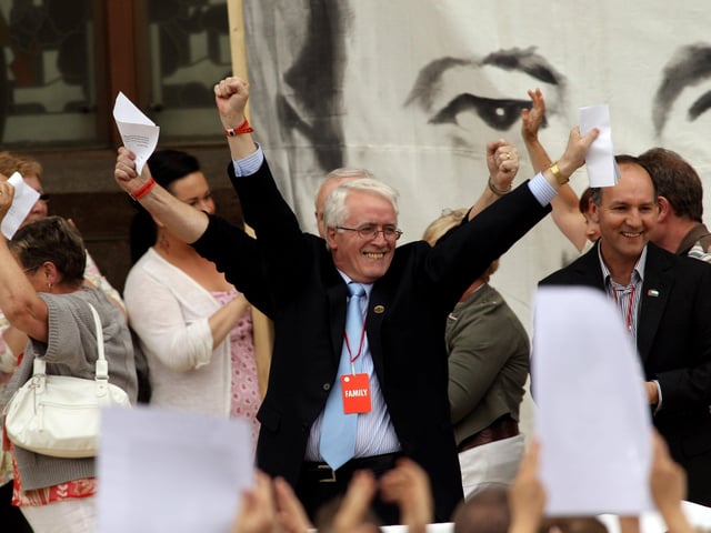 John Kelly salutes the crowd at Guildhall Square.
