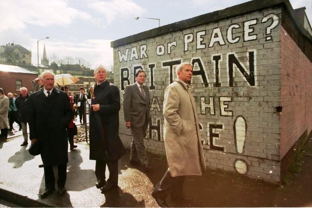 Lord Saville and his tribunal colleagues on a visit to the Bogside.