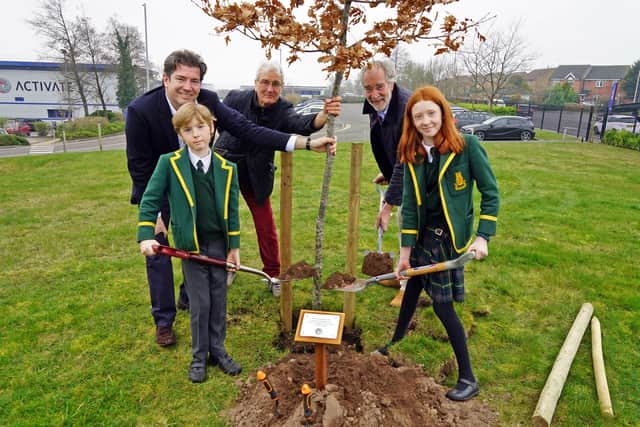 George and Jemima Linney planting a tree at the special ceremony.
Back, Charles Linney executive director, Patrick Chandler chief executive of Sherwood Forest Trust and Nick Linney, Chairman.