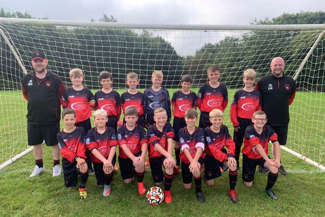 Manager Ben Newton, pictured with his under twelves team.