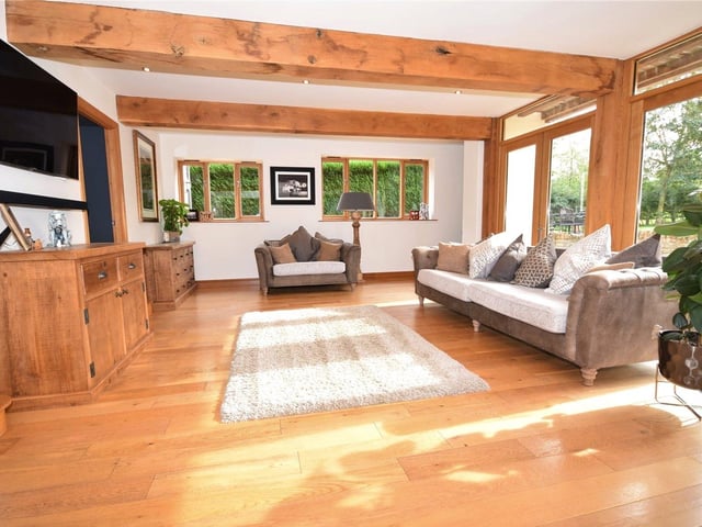 The living room offers so much light and space, not to mention triple-aspect panoramic views across the grounds of Moles End.