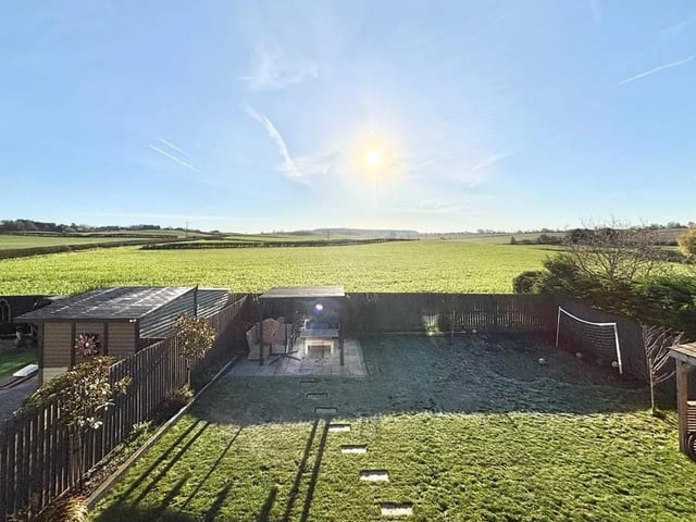 The property enjoys stunning views over open fields