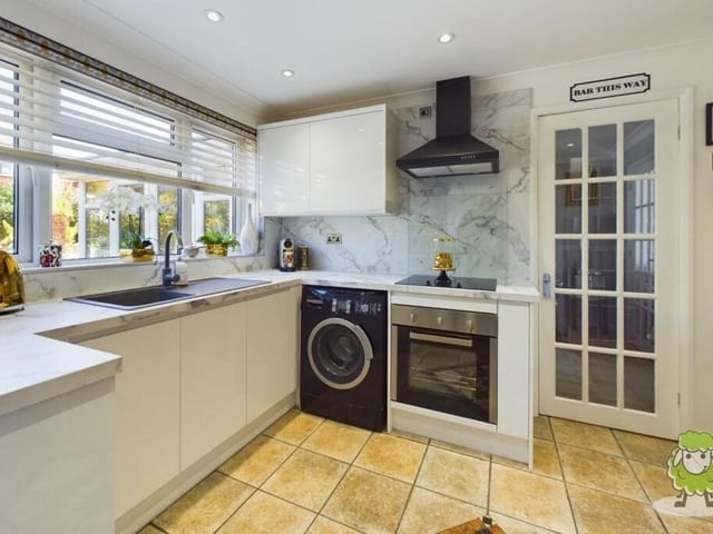 Next stop is the bright kitchen, which boasts modern units and appliances, guaranteeing both functionality and style.