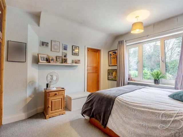 One of five spacious bedrooms in the large property