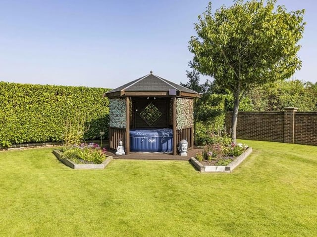 Another of the distinctive buildings in the garden, which could perhaps house a hot tub.