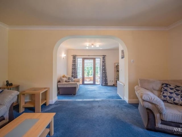 The social hub of the £475,000-plus home is this spacious, split-level lounge, which leads to the conservatory. It is the ideal room for all the family to get together.