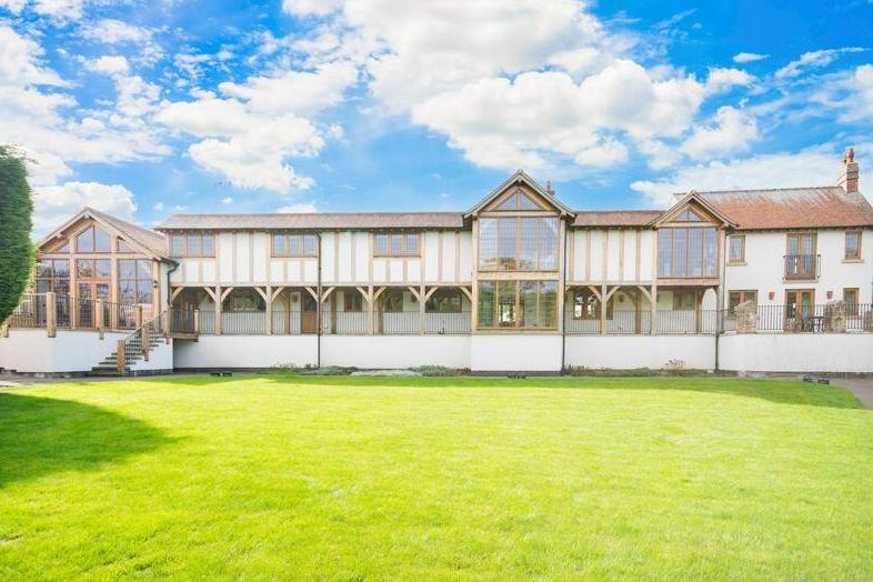 The £1 million property looks as spectacular from the rear as from the front. Its unique design almost gives it a marvellous medieval-type appearance.